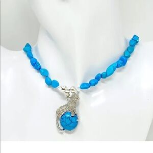 Magnesite necklace with tiger pendant + earrings